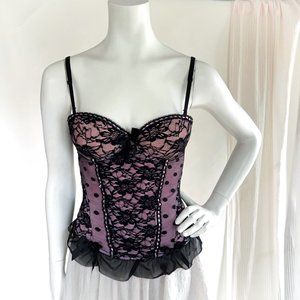 Pink corset with black lace and polka dot pattern
